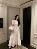 French Word Shoulder Long Sleeve White Dress Texture High Sense 2026 New Early Autumn Temperament Long Dress