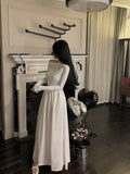 French Word Shoulder Long Sleeve White Dress Texture High Sense 2026 New Early Autumn Temperament Long Dress