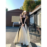 Black And White Spliced Sling Dress Dress 2026 New Summer Design Sense Slimming Long Skirt