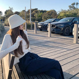 Knitting Season_Soft Sky Silk Sling With Two Sets Of White Knitted Cardigan Outside Sunscreen
