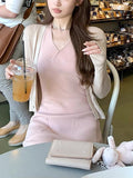Knitting Season_Soft Sky Silk Sling With Two Sets Of White Knitted Cardigan Outside Sunscreen
