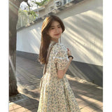 Summer 2026 New Seaside Holiday Temperament Floral Dress Orange Tea Break French Dress Girl Loose