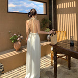 Sanya Seaside Resort Beach Dress Women 2025 Spring And Summer New Design Sense Of The Back Sexy Hanging Neck Dress